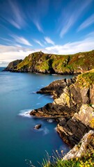 Fototapeta premium Coastal scene with cliffs, sea, and wispy clouds