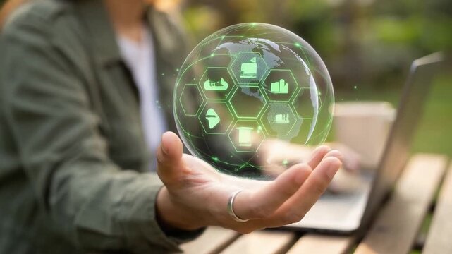 Sustainability manager managing global carbon footprint using digital technology and ESG industry icons. Concept of CO2 reduction, green supply chain, sustainable industry, circular economy