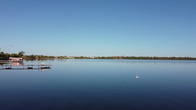 Aerial View of Geese Flying Over Lake in Bemidji Minnesota