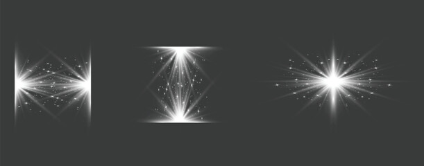 Abstract bright white glowing light lens flare effects with sparkles and starburst particles on dark background.