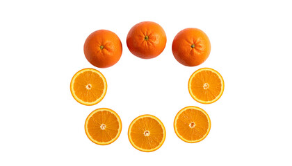 Bright oranges and slices arranged in a circular pattern on a black background
