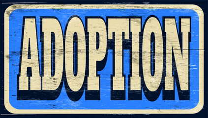 Aged retro adoption sign on wood