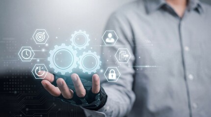 Human hand displaying glowing digital gears and interconnected icons symbolizing business process automation and workflow optimization