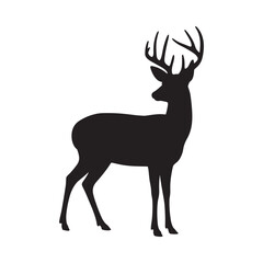 Fototapeta premium Silhouette of a majestic stag with large antlers facing towards the left