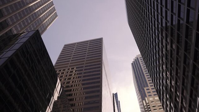 Modern Corporate Buildings with Glassed office building exterior in the windows.