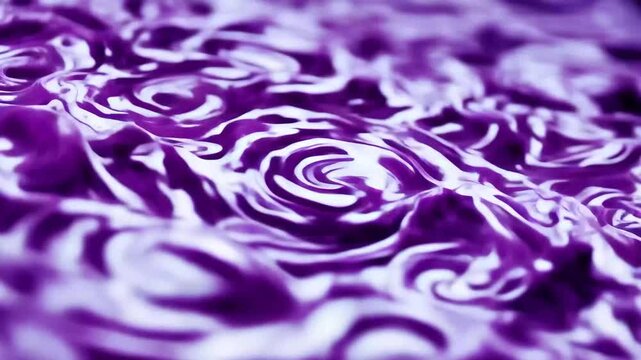 Water moves in curved shapes and purple patterns showing ripples and waves in an abstract way at different speeds and angles