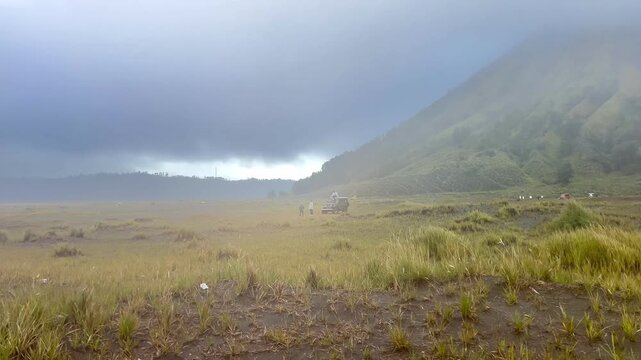 The beautiful scenery of Mount Batok and Teletubbies Hill in the Bromo Savanna area, Bromo Tengger Semeru National Park (TNBTS), Wonokitri Village, Tosari District, Pasuruan Regency, East Java