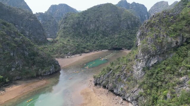 Drone view to karst mountains with the waters of Ha Long Bay near Cat Ba Island, Vietnam. 