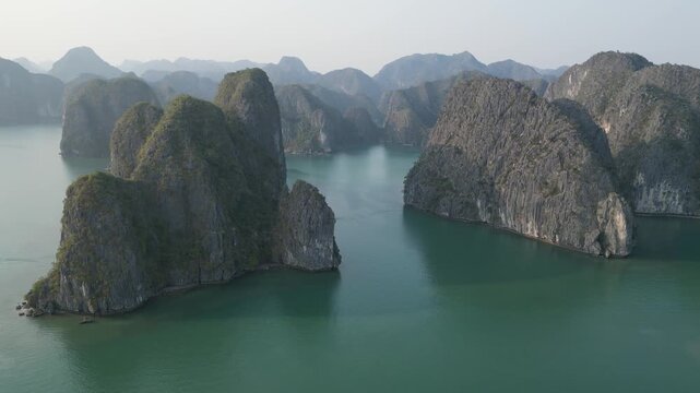 Drone view to karst mountains with the waters of Ha Long Bay near Cat Ba Island, Vietnam. 