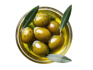 Glass bowl of green olives in oil, topped with leaves