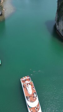 Drone view to karst mountains with the waters of Ha Long Bay near Cat Ba Island, Vietnam. 