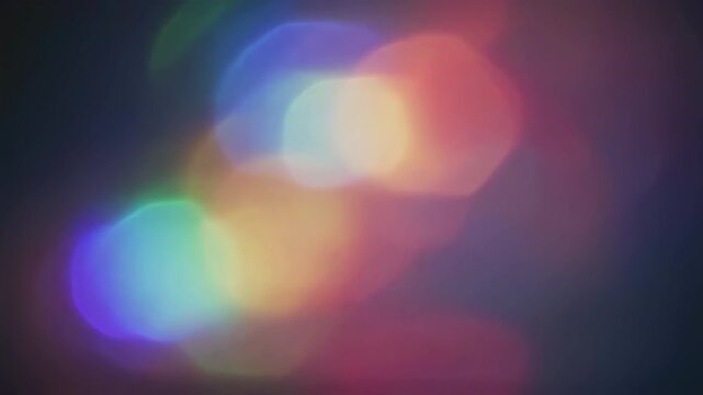 Multicolored abstract light leak overlay with soft bokeh and retro film burn effect