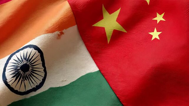 indian and chinese flag waving together. relations between india and china. agreement trade deal partnership brics friendship