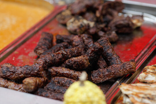 Details with mititei (mici), grilled minced meat in a farmers market