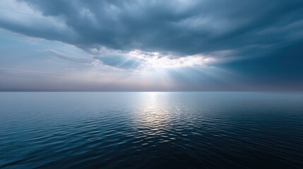 Obraz premium Serene Ocean Horizon with Mysterious Clouds and Soft Sunlight Breaking Through the Sky, Capturing Tranquility and Peaceful Nature Vibes