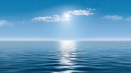 Fototapeta premium Tranquil Blue Sea Under Bright Sunlight with Reflection on Water Surface and Gentle Clouds in a Clear Sky