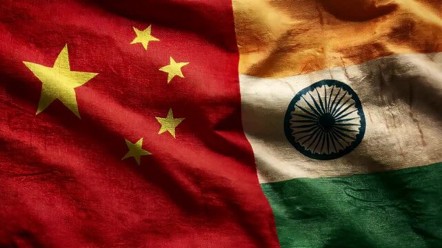 chinese and indian flag waving together. relations between china and india. agreement trade deal partnership brics friendship