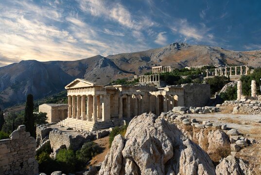 Panoramic view of ancient temple ruins in a rugged mountain landscape
