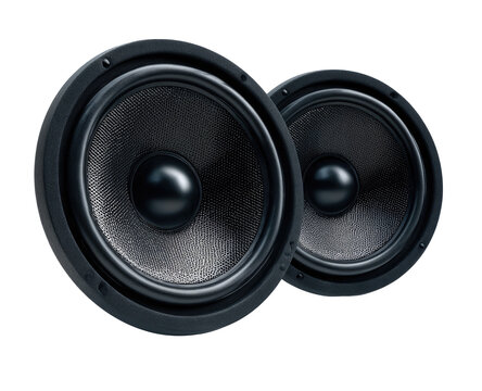 Two black audio speakers.  Close-up view of speaker cones