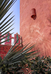 Vibrant Moroccan-Inspired Architecture with Palm Foliage