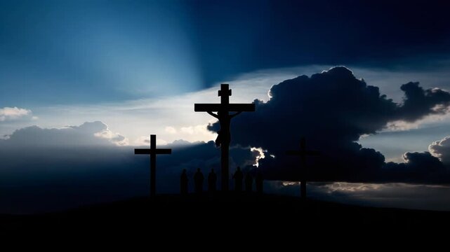 Silhouette of Jesus Christ on cross with followers on hilltop at sunset