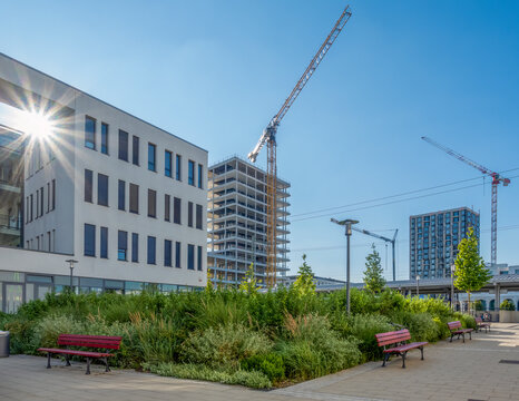 Construction site with cranes and residential building in Munich Freiham