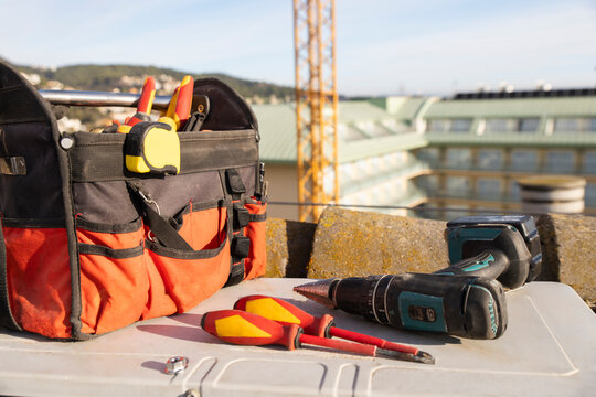 Toolbox and drill on construction site for solar installation