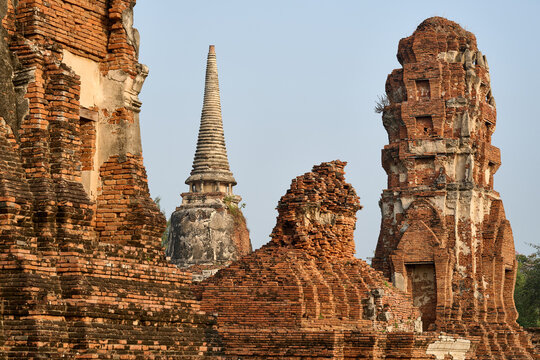 Ancient brick prang and stupa towers at Ayutthaya temple ruin
