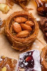 Crispy kataifi bird nest pastry with almonds and turkish delight