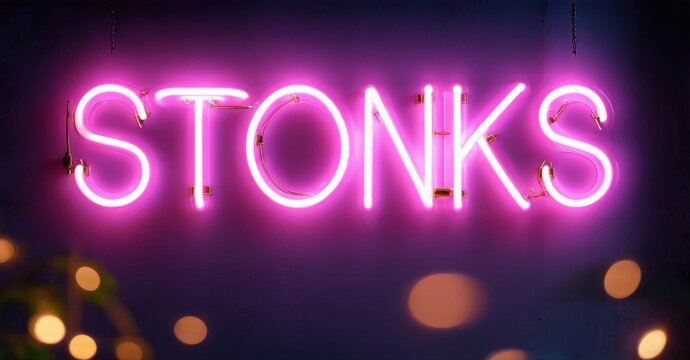 Bright pink neon sign spells STONKS. Background is dark purple with blurred lights. Modern, playful aesthetic.