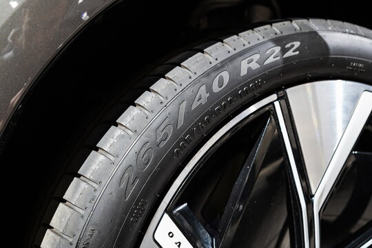 Zurich Auto Show, Switzerland, October 31, 2025. Close up view of the large 22 inch wheel with 265 40 r22 sized tire on the new Volvo XC60 crossover SUV displayed at the Zurich Auto Show