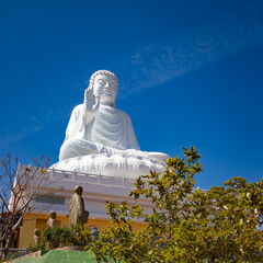 Buddha statue at Chua Hue Chieu temple in Kontum, Vietnam © Olga Khoroshunova