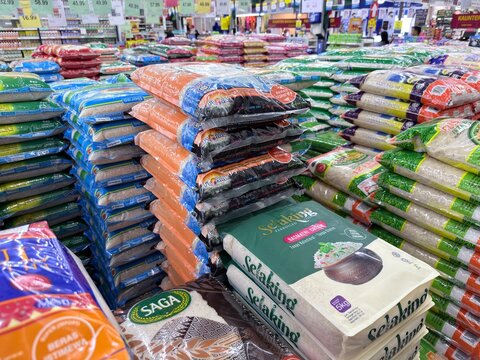 Rawang, Selangor, Malaysia - &lrm;January 28, 2026 - Rice bags stacked neatly in a supermarket for household and daily cooking use.