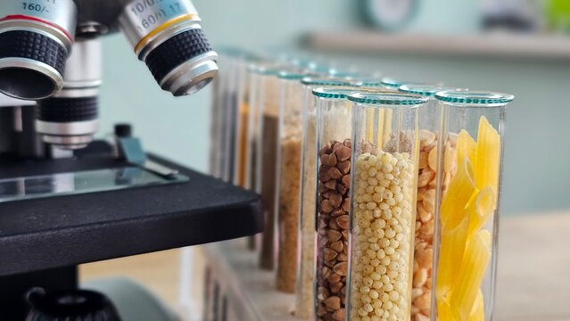 Colorful display of spices and herbs in test tubes during culinary experimentation in a lab