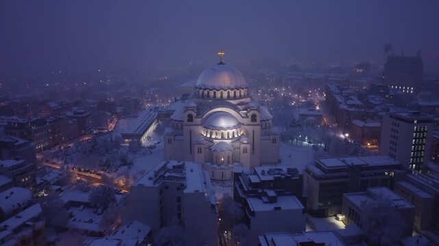 Drone view of Saint Sava, orthodox church in Belgrade, Serbia in winter snowing time.