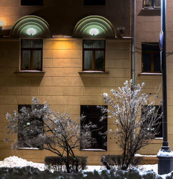 
A winter cityscape with old historic buildings covered in a glistening layer of ice after freezing rain