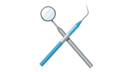 Dental instruments crossed over each other on a plain white surface viewed from directly above