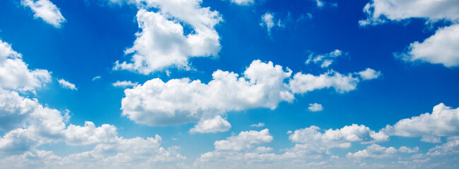 White clouds in blue sky.