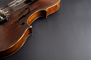 Violin music instrument of orchestra closeup on black