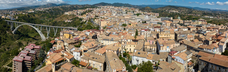 Obraz premium Aerial view of the historic center of Catanzaro, Italy. This city is the capital of the Calabria region. In the background is the Bisantis Viaduct, the access bridge to the city.