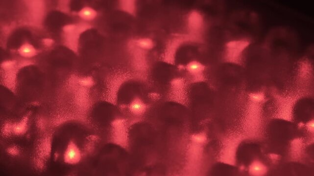 Macro shot of glowing multicolored LED Light emitting diode lamp bulbs