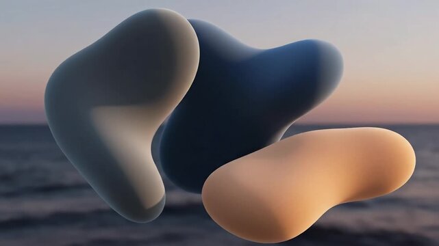 Abstract organic forms float serenely against a tranquil ocean sunset creating a calming and modern visual for design projects needing an artistic touch