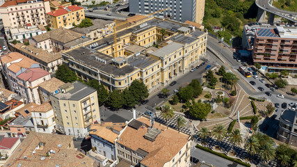 Obraz premium Aerial view of Piazza Matteotti, located in the historic center of Catanzaro, Calabria, Italy. The square is surrounded by the houses, buildings, and roofs of the city.