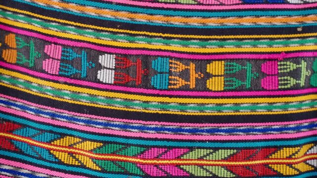 Colorful Mayan textile with geometric patterns woven by hand