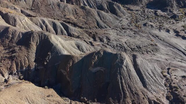 Aerial drone shot flying over the Tabernas Desert, a wild and arid landscape in Andalusia, Spain