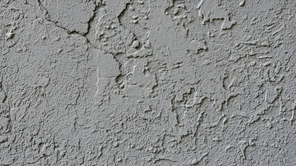 Weathered gray concrete surface with cracks and texture