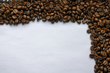 roasted coffee beans on white background