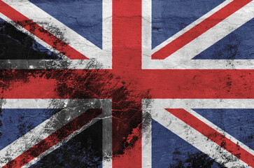 Fototapeta premium British Union Jack flag on the old wall