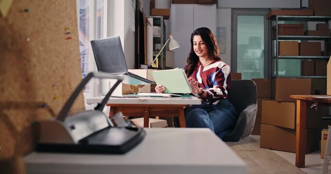Ecommerce, woman and smile with tablet, report and research for web order or supply chain. Small business, entrepreneur and scroll with tech for distribution, procurement and logistics in startup