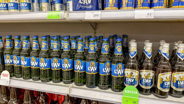 Bottles of golden-hued LAW  brew gleam in neat rows, ready for Oktoberfest revelry or Serbian Slava celebrations September 5, 2025, Subotica, Serbia
